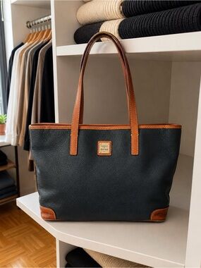 Dooney & Bourke Navy Pebbled Leather Tote with Tan Trim and Gold Plaque